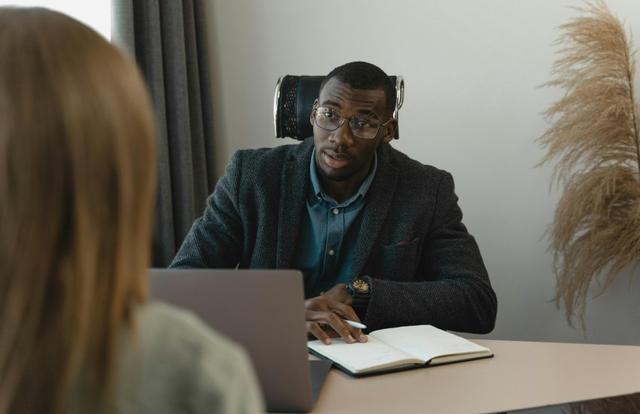 two professionals doing a job interview