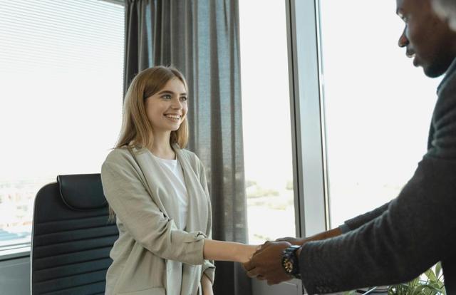 two people shaking hands