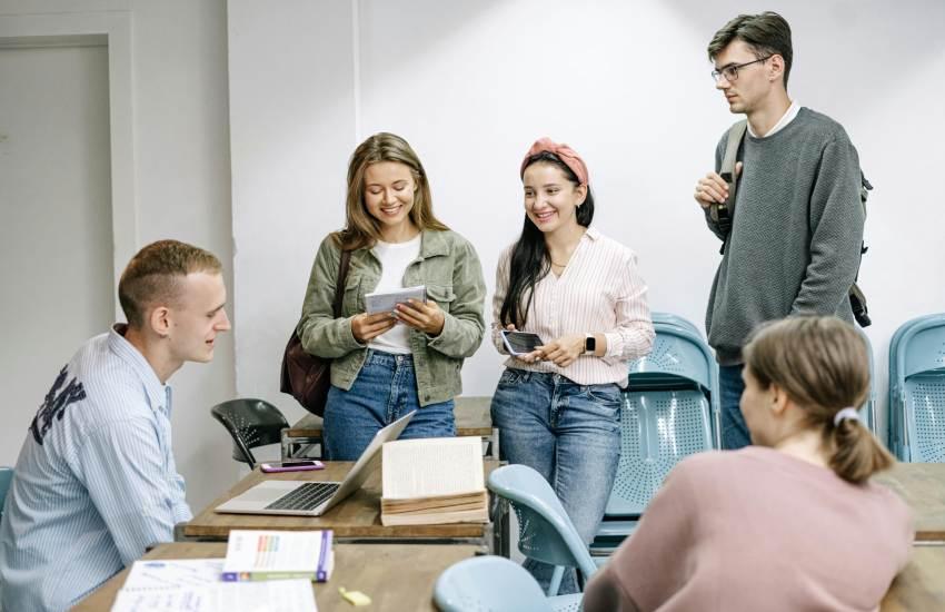 Group Of People Studying Together.