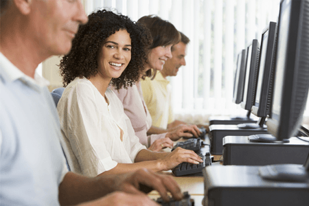 woman working on her computer in an office